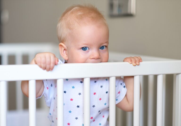 Sleepless Night: Dealing with a Baby Sits Up in Crib at Night And Cries in the Crib