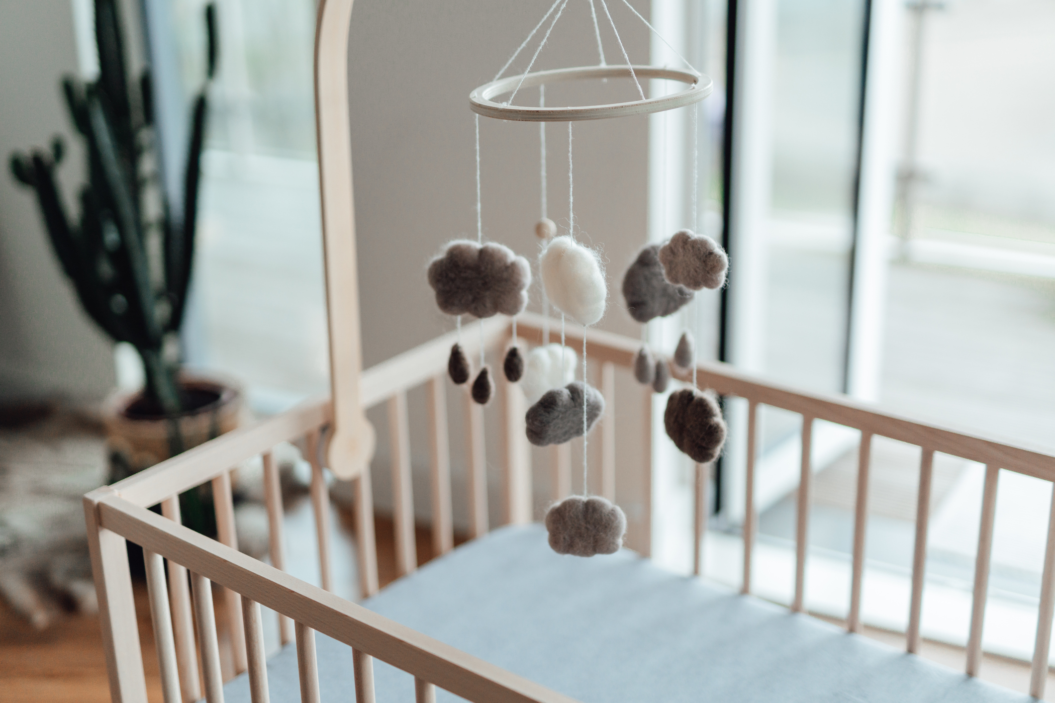 How to Hang a Mobile Over a Crib?